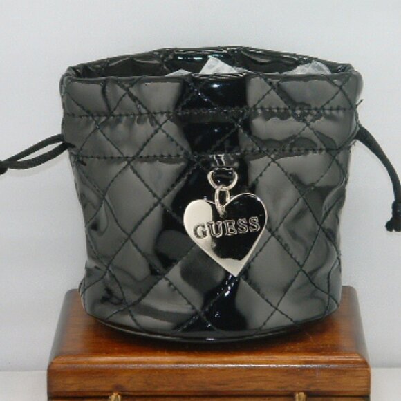 GUESS Black Quilted Patent Leather Mini Drawstring Bag with Heart Charm - Picture 1 of 3